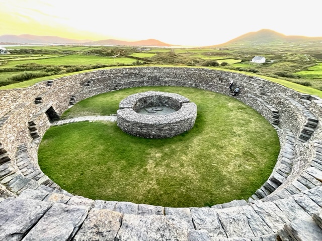Destination Wedding Ireland - Wedding Ceremony in an ancient stone fort in County Kerry. Caroline McCarthy Registered Solemiser & Celebrant conducting the wedding or elopement ceremon in Ireland